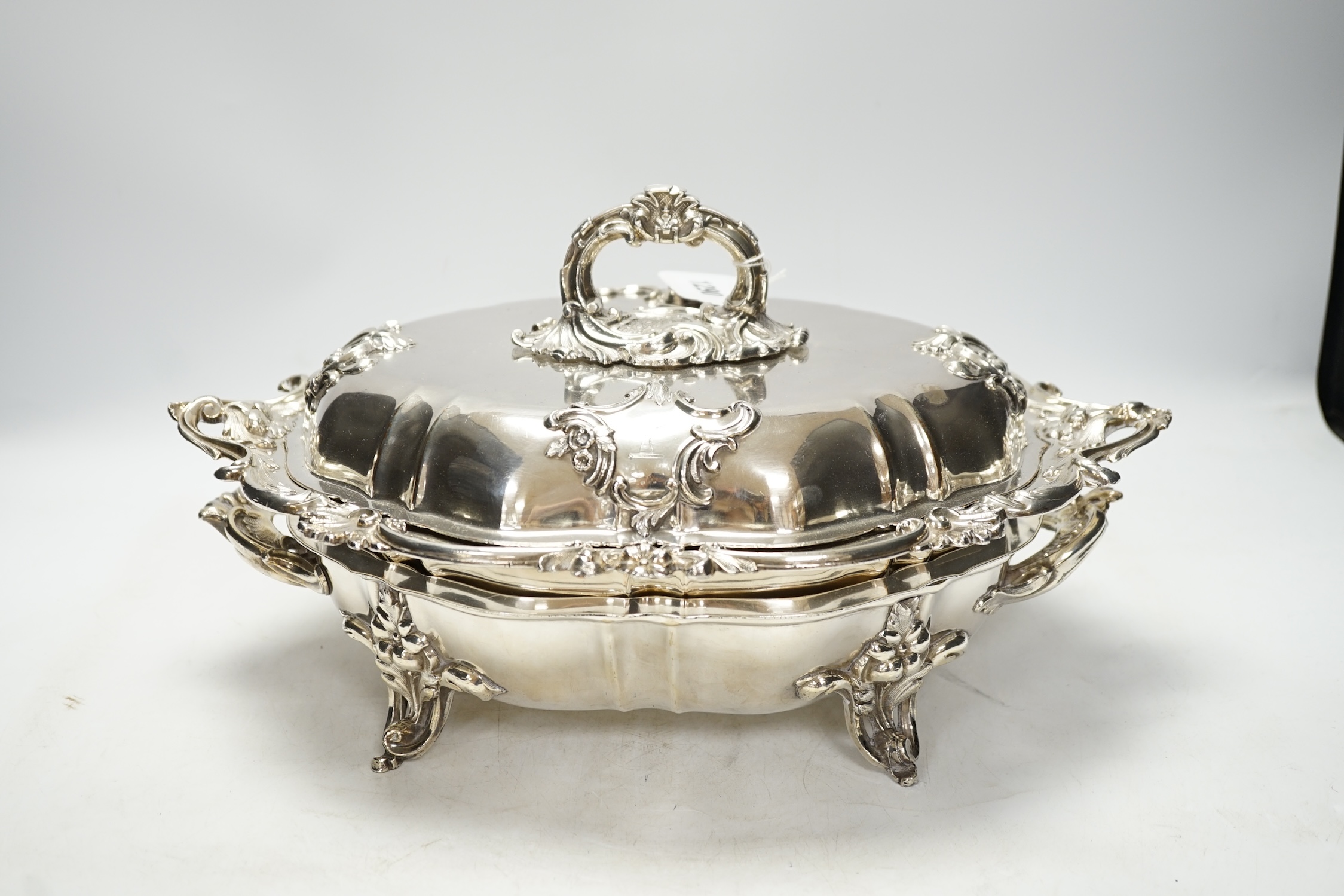 A Victorian Old Sheffield plate entrée dish, cover and warmer, 38cm wide. Condition - fair to good